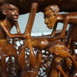 MAKONDE COFFEE TABLE CARVED IN THE MAKONDE STYLE, IN ONE PIECE MONGONGO WOOD